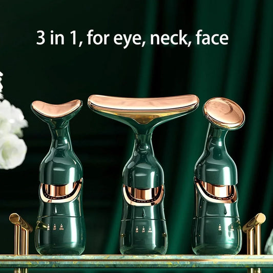 3-in-1 green and gold facial massager tools for eye, neck, face skincare on marble surface